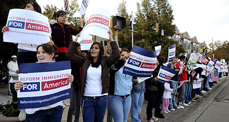 Reform Immigration for America Campaign Signs Crowd. Plural Brand Strategy and Design